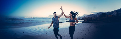 Couple Running on the Beach. Benefits of Collagen for Weight loss. Strong Cell, NADH, CoQ10, Collagen for Cellular Health