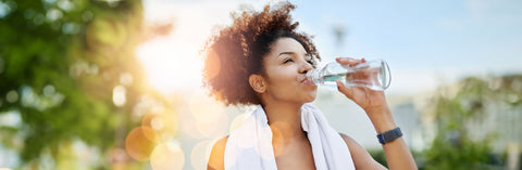 Woman Drinking Water - Natural Ways to Suppress Your Appetite